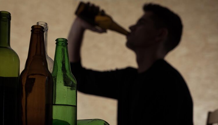 Teenager drinking beer